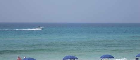 On the beach, sun-loungers