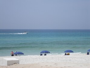 On the beach, sun-loungers