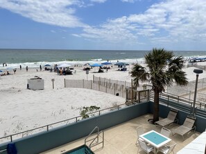 On the beach, sun loungers