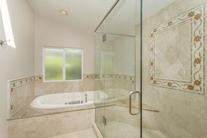 Bathtub, jetted tub, hair dryer, towels