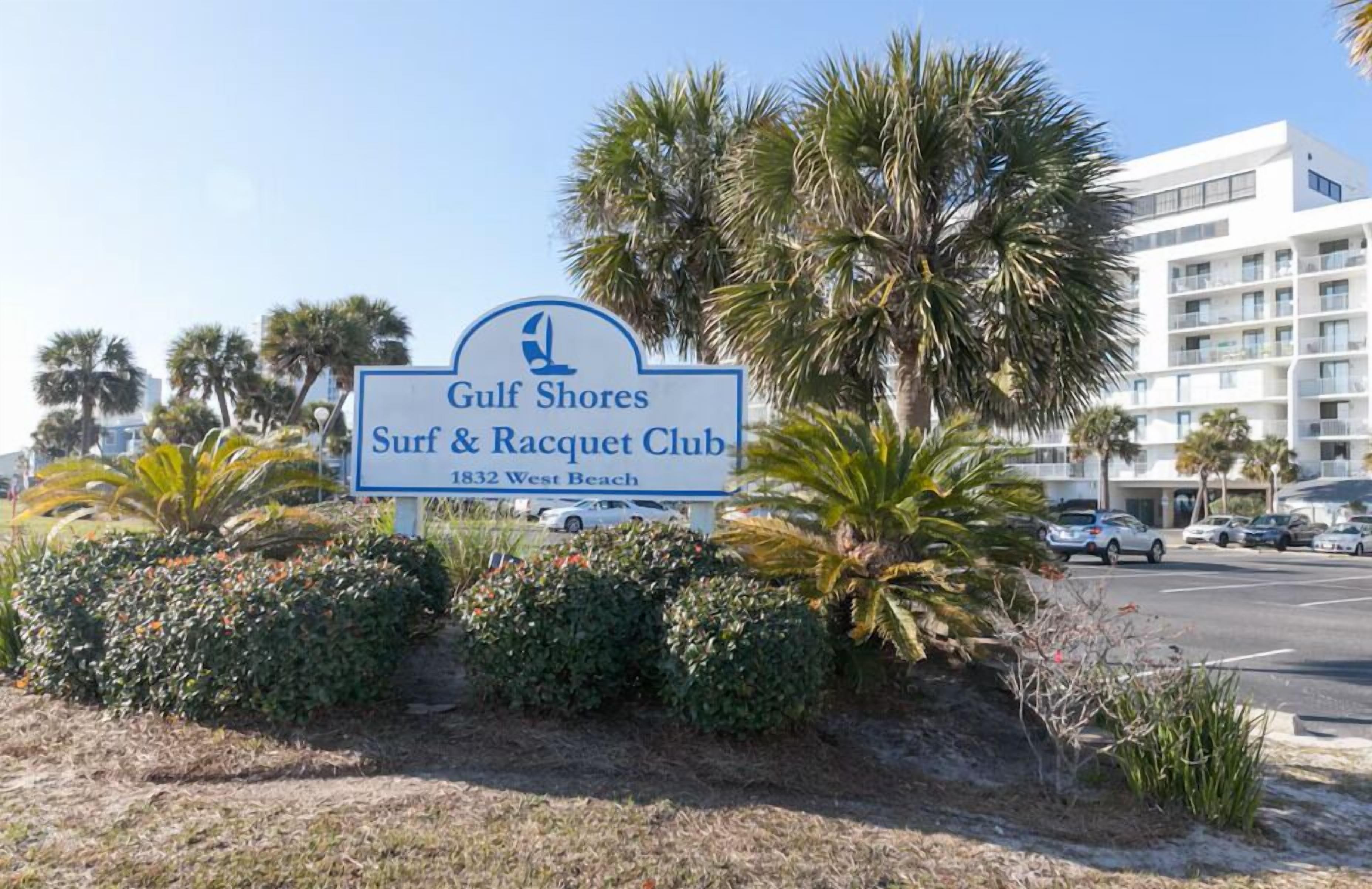 A sign for Gulf Shores Surf & Racquet Club at 1832 West Beach.