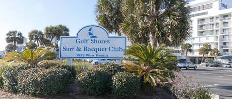 A sign for Gulf Shores Surf & Racquet Club at 1832 West Beach.