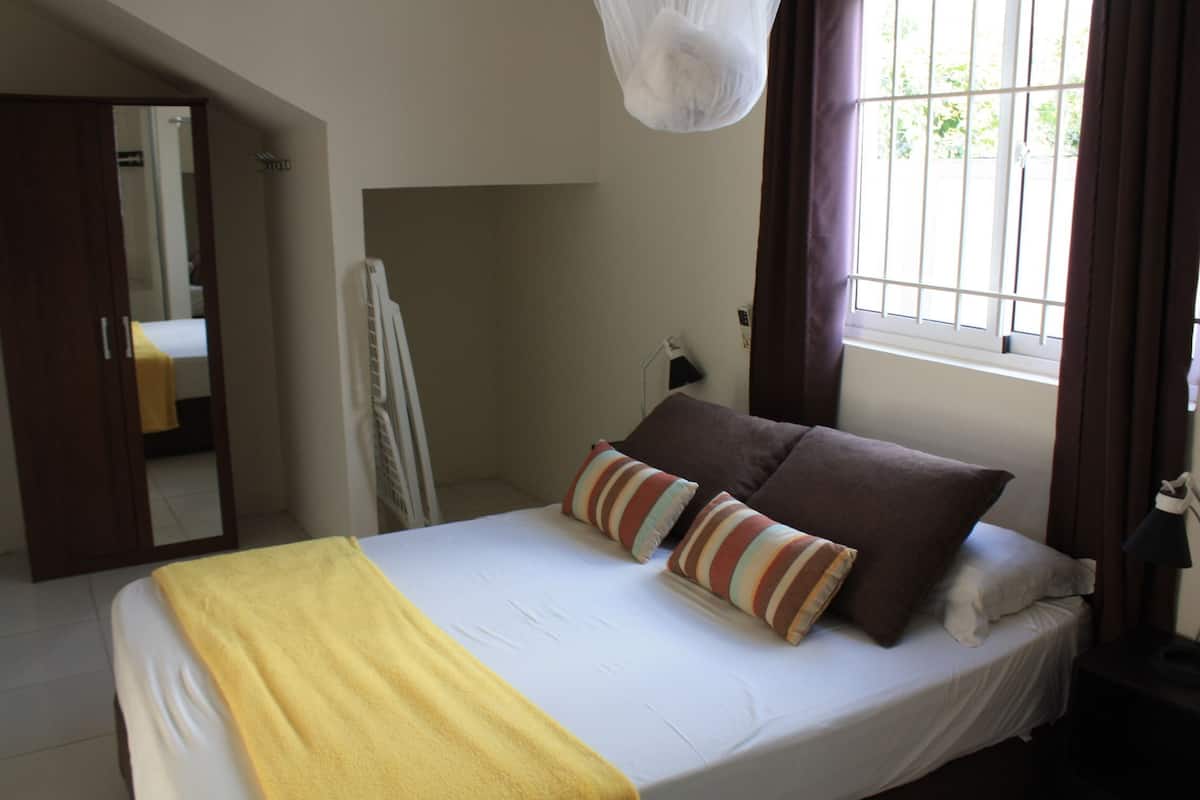 Apartamento, 1 habitación, cocina básica | 1 dormitorio, caja fuerte, cortinas opacas