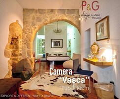 Habitación cuádruple de lujo (Vasca) | Ropa de cama de alta calidad y edredones de plumas