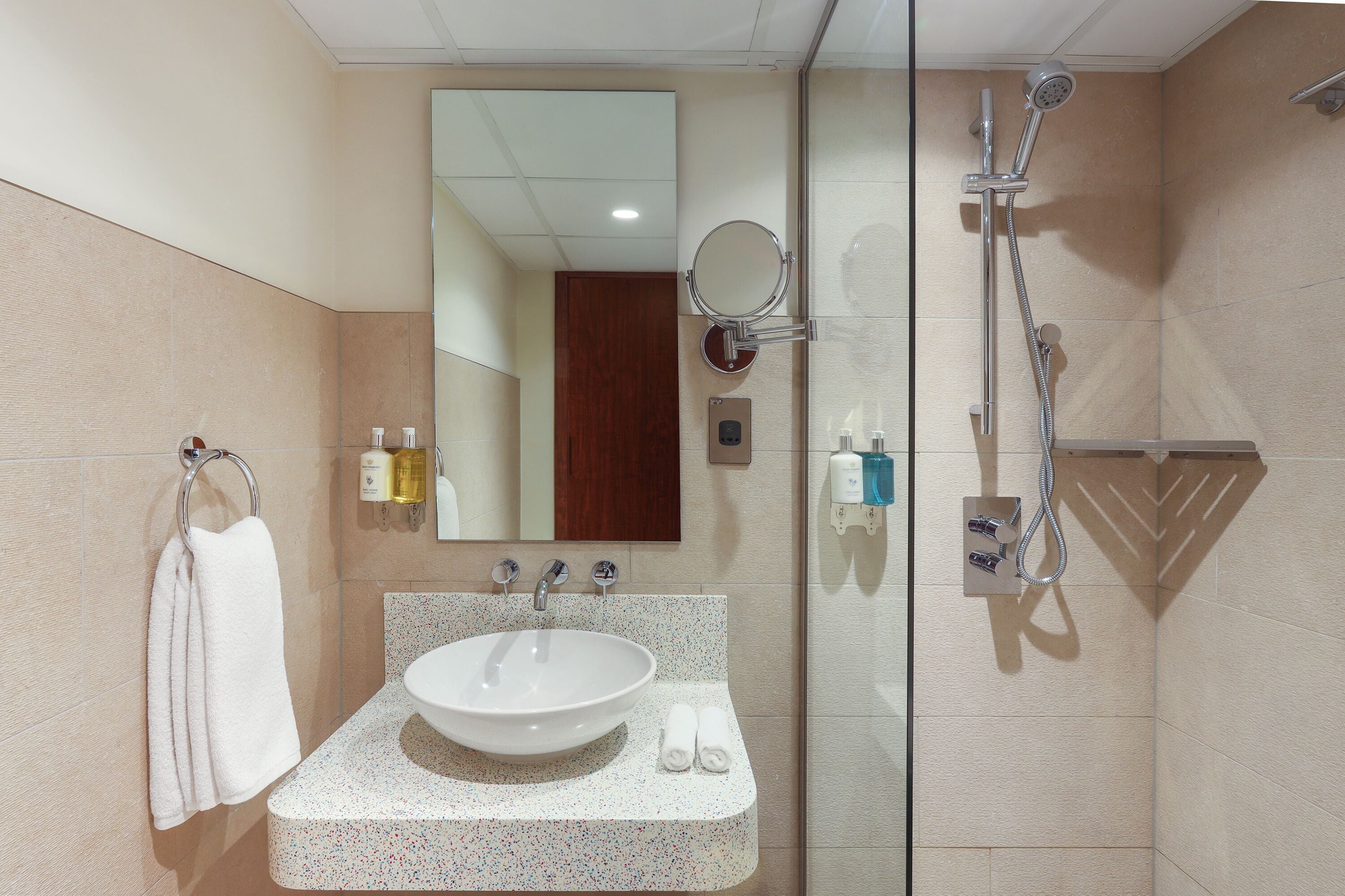 eco-friendly toiletries, hair dryer, bathrobes, slippers