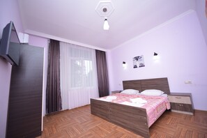 Premium bedding, desk, iron/ironing board, rollaway beds