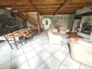 TV, fireplace - Homerez - Charming House in Lanobre with Garden (Lanobre)