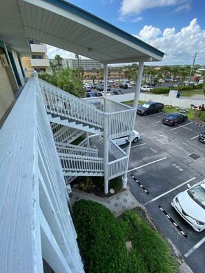 Guests can park their vehicles in the adjacent multi-level parking area.