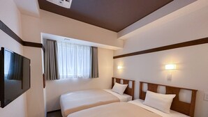A hotel room with two beds, a television, a window with curtains, and wall-mounted lights. - The OneFive Tokyo Shibuya (Tokyo)
