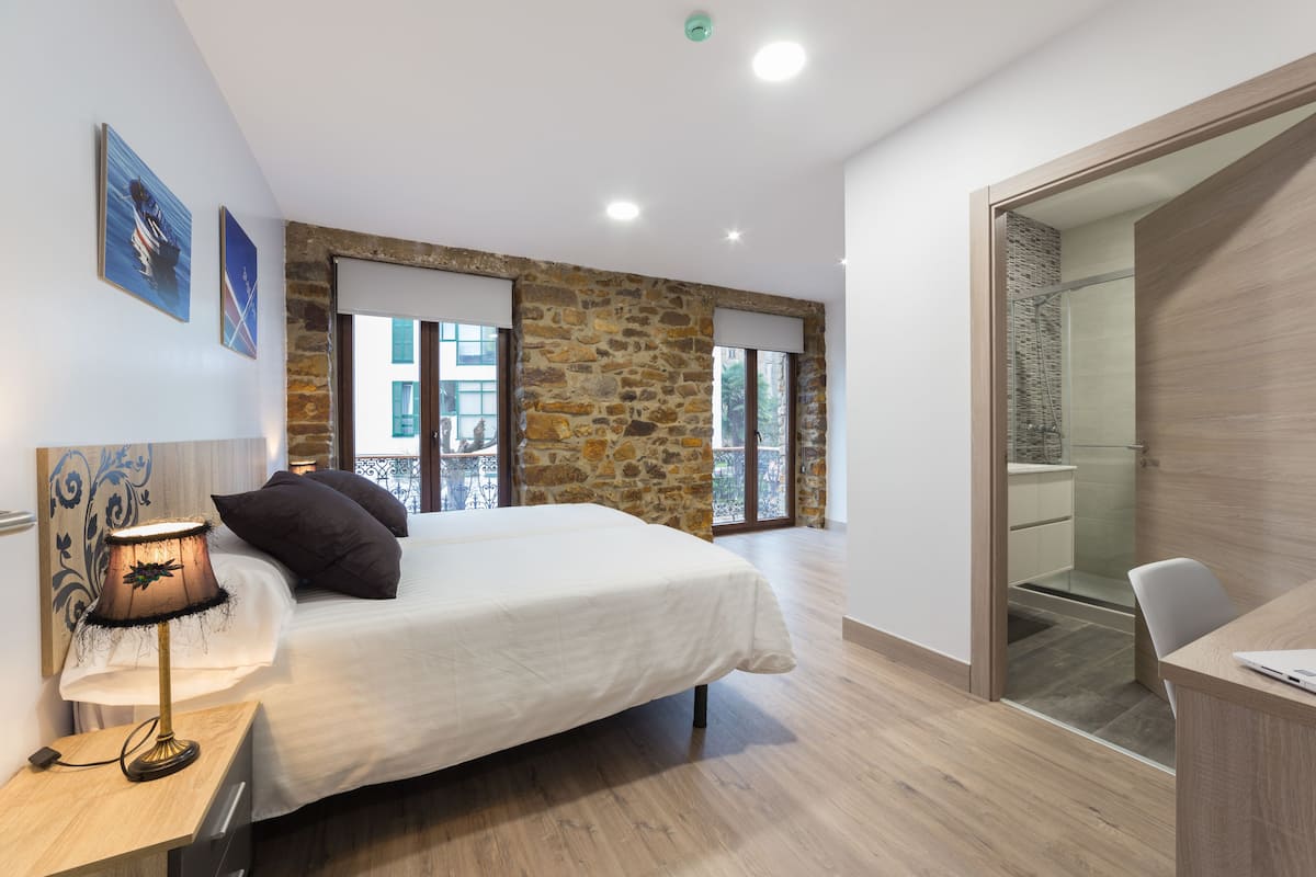 premium bedding, memory-foam beds, in-room safe, desk