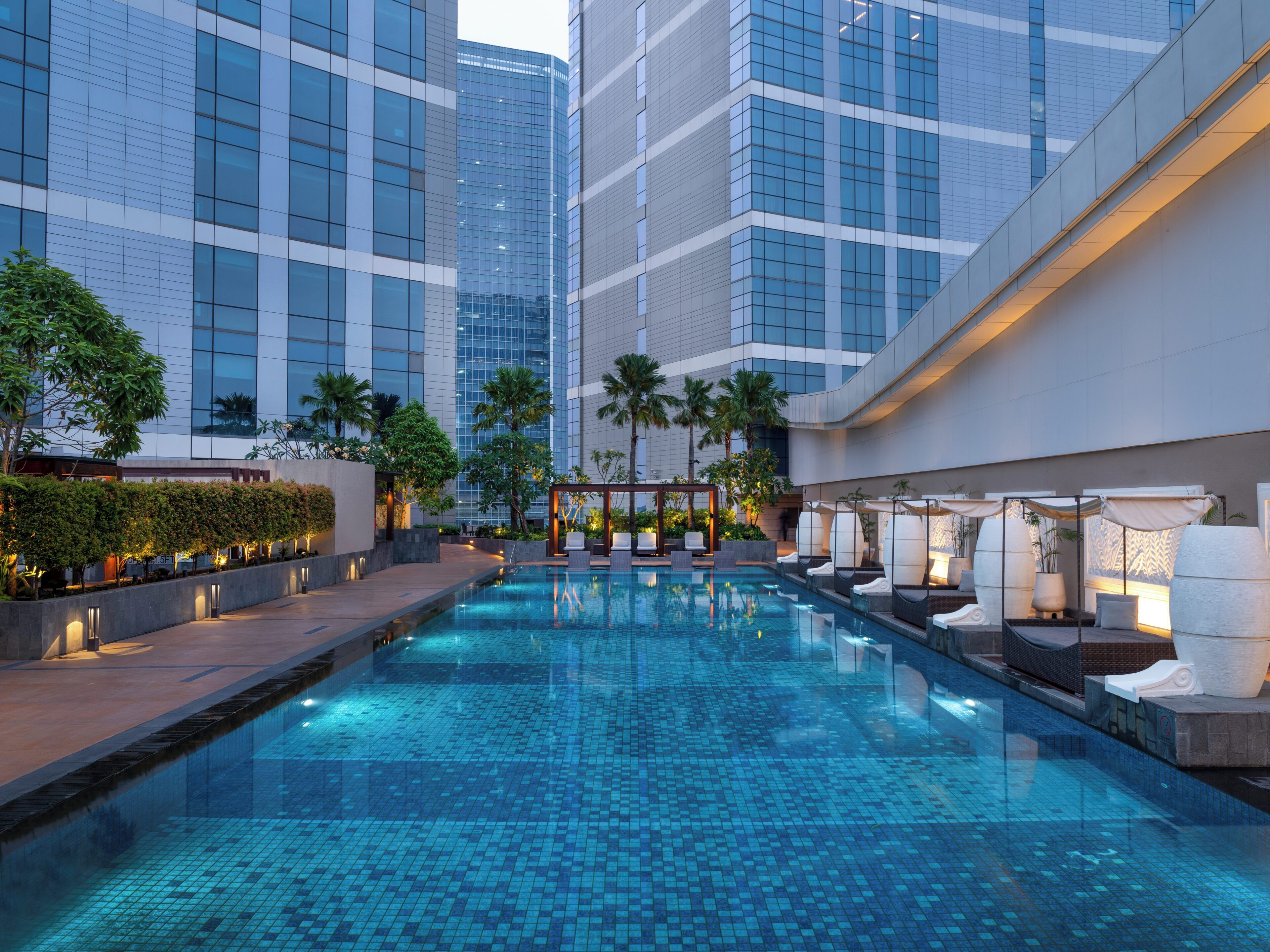 Outdoor pool, open 6:00 AM to 9:00 AM, cabanas (surcharge)