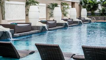 Outdoor pool, open 6:00 AM to 9:00 AM, cabanas (surcharge)