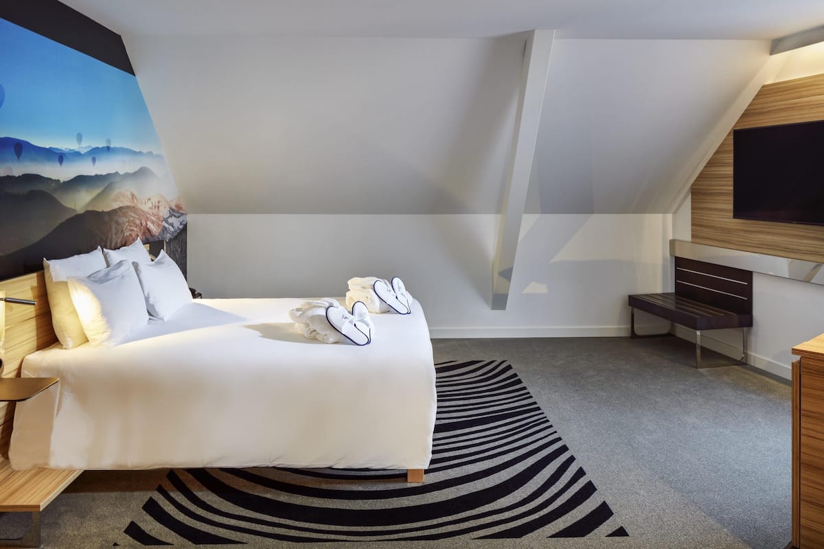 Suite – executive, 1 queensize-seng | Sengetøy av topp kvalitet, minibar, safe på rommet og blendingsgardiner