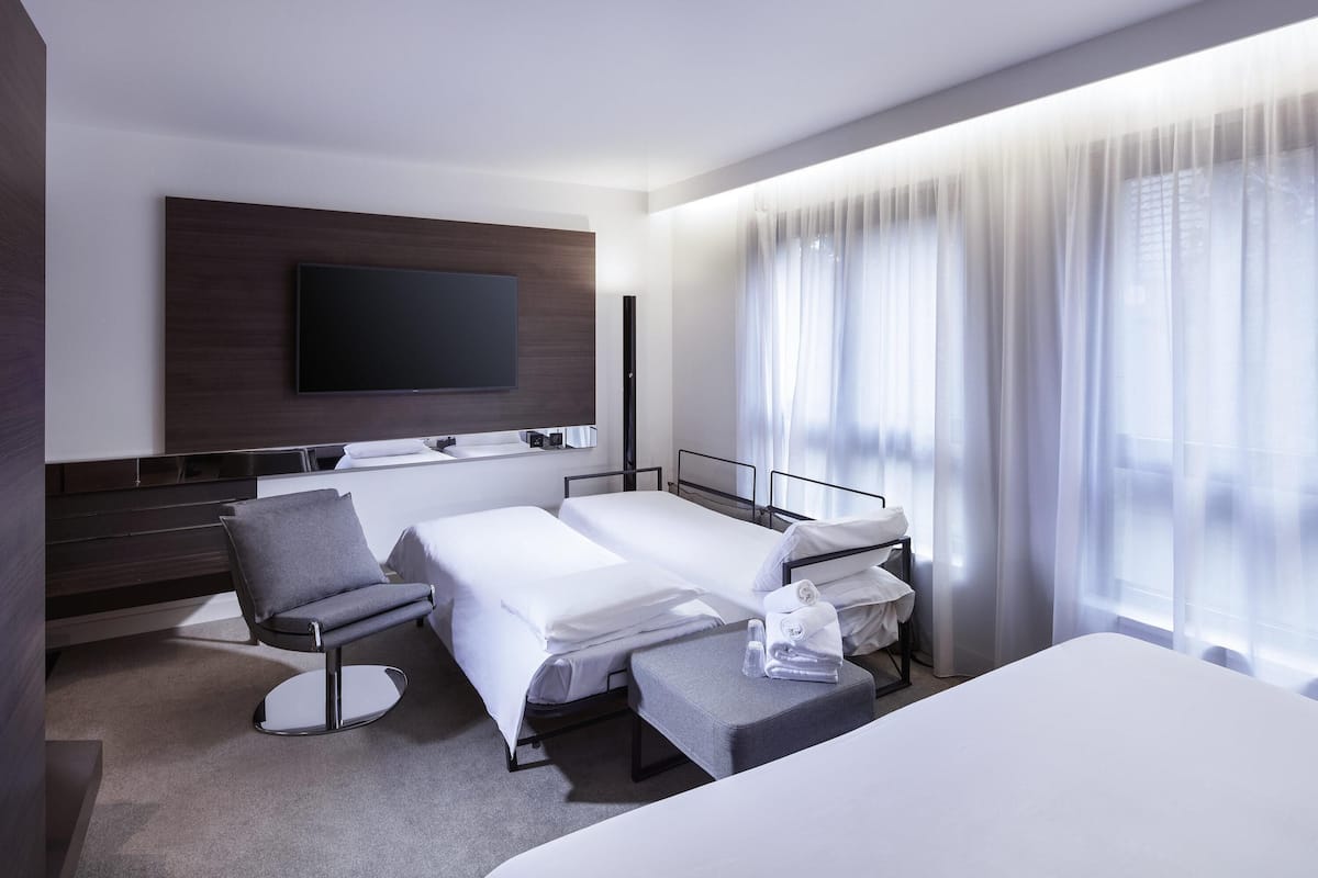 Premium bedding, minibar, in-room safe, blackout drapes