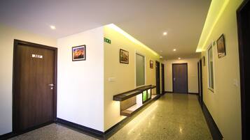 Habitación Deluxe | Baño | Ducha y cabezal de ducha tipo lluvia