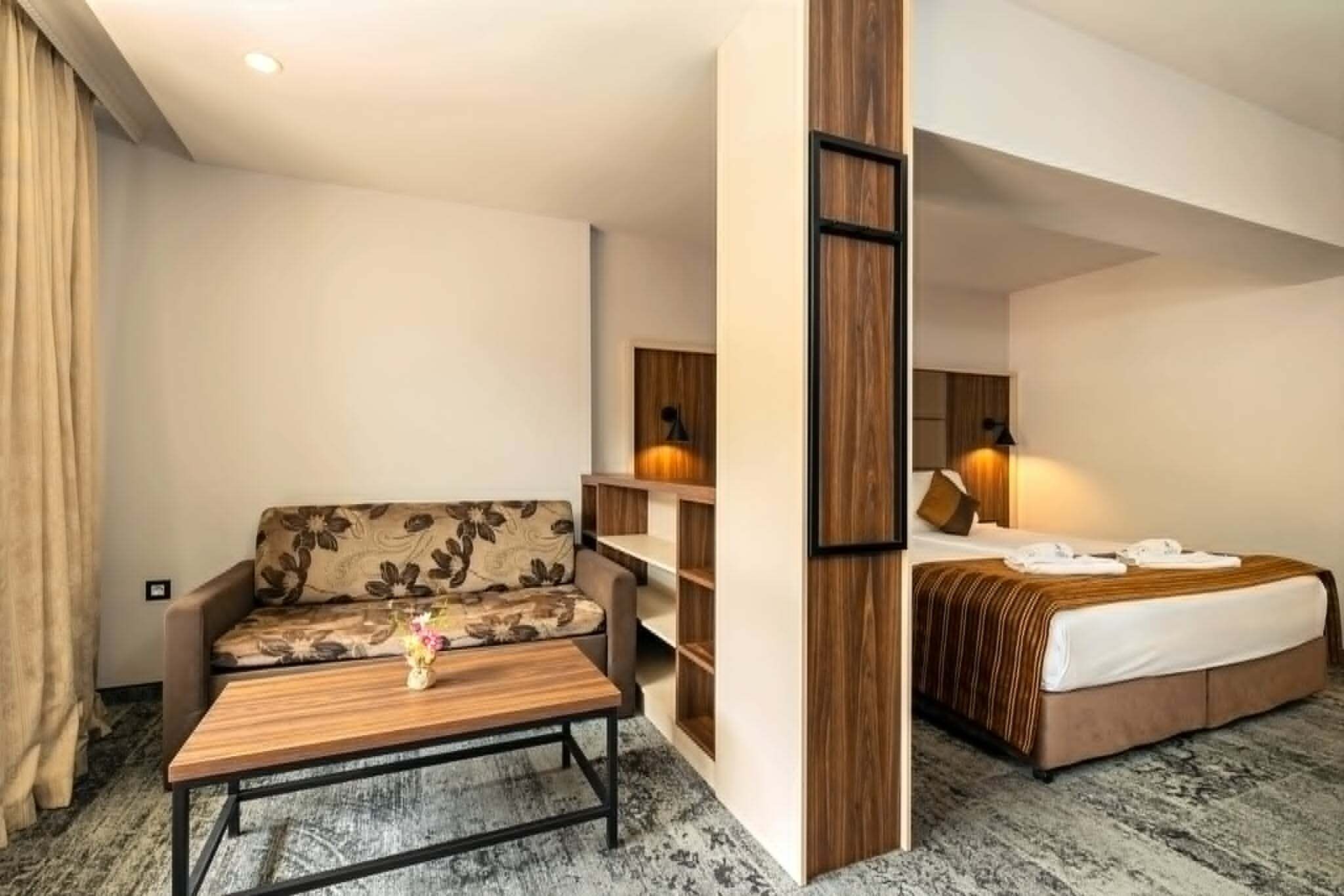 Deluxe Double Room, Pool View | Minibar, in-room safe, desk, blackout drapes