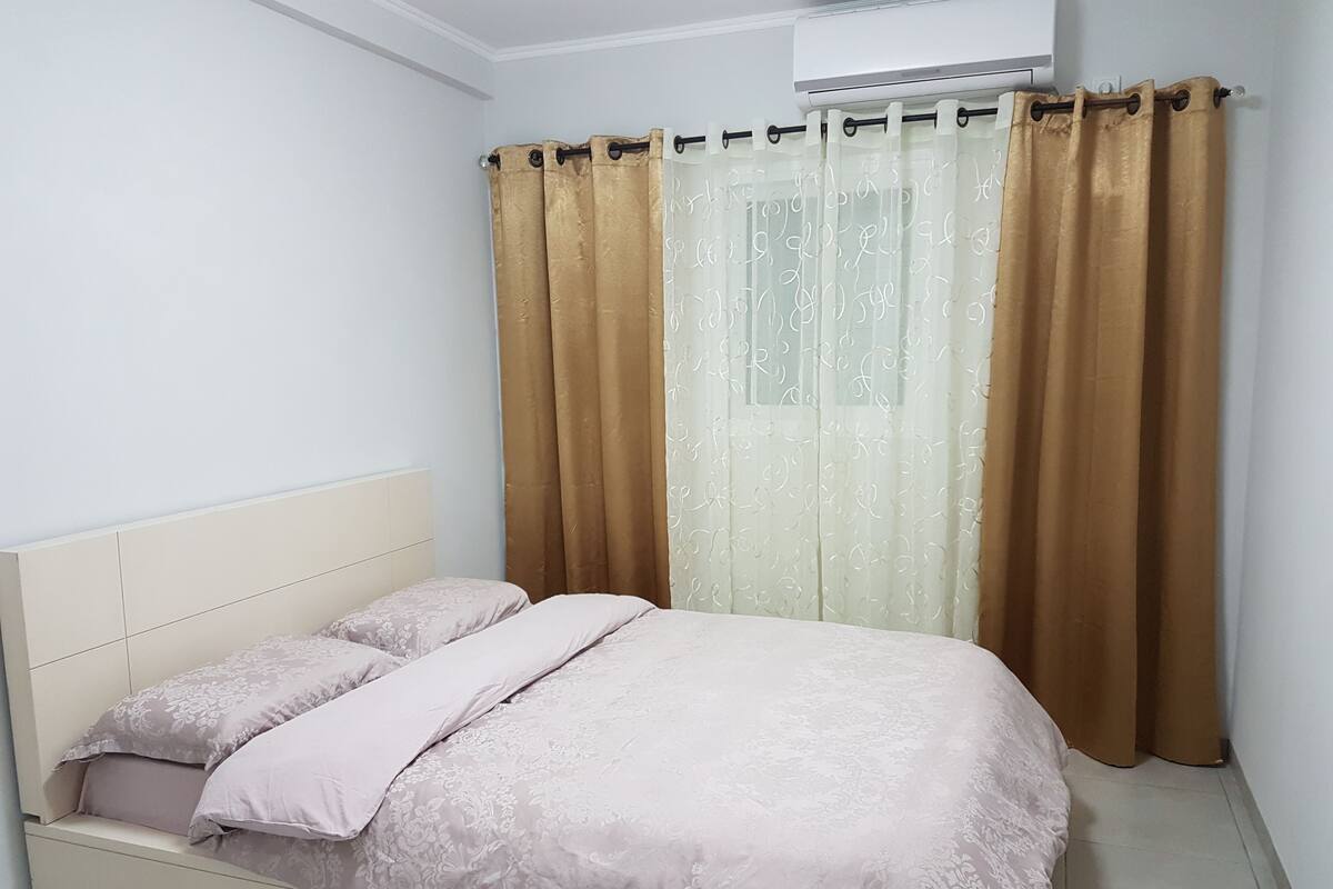 Apartment, 1 Bedroom | Living room | Flat-screen TV