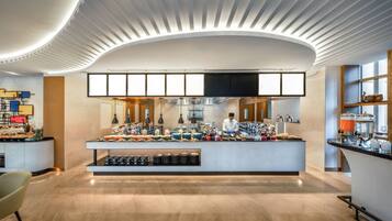 Petit déjeuner buffet (25 USD par personne)