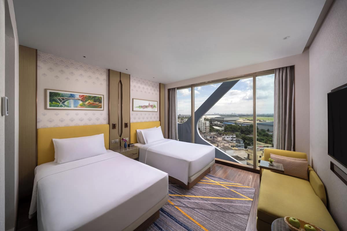 Room, 2 Twin Beds (Runway View) | Minibar, in-room safe, iron/ironing board, free WiFi