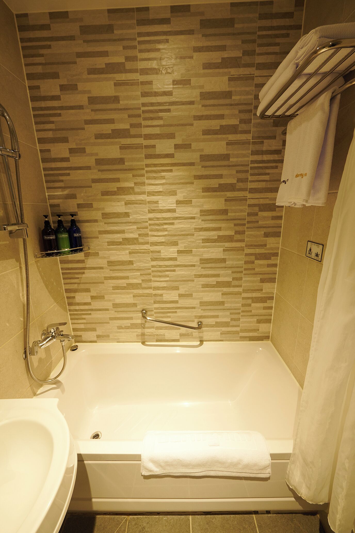 hair dryer, bathrobes, slippers, bidet