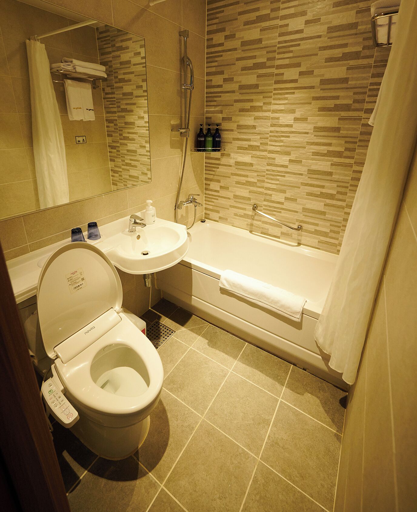 hair dryer, bathrobes, slippers, bidet