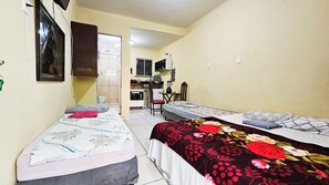 Kitnet | 1 habitación, minibar, cortinas blackout y wifi 