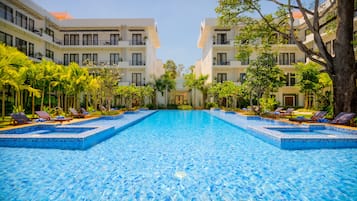 Outdoor pool, open 7 AM to 7:00 PM, pool umbrellas, sun loungers