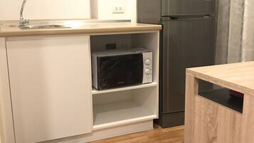 Comfort Condo | Private kitchenette | Fridge, microwave