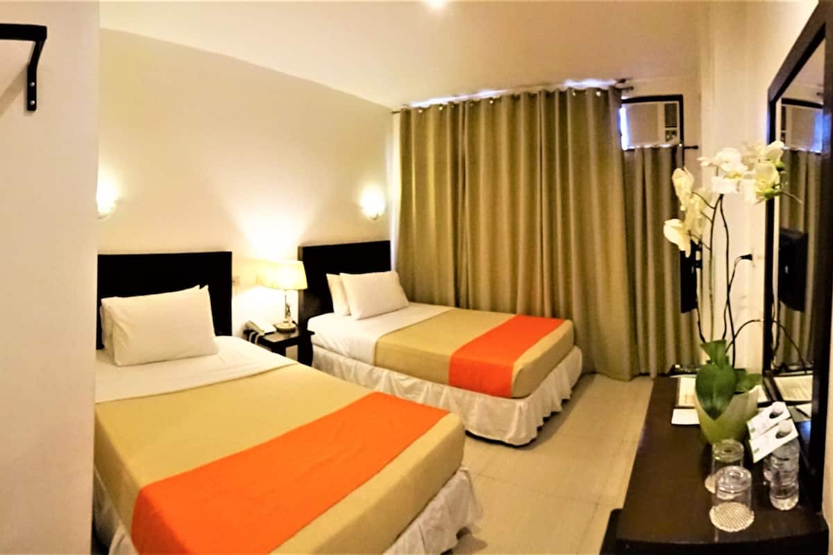 Desk, blackout curtains, free WiFi, bed sheets