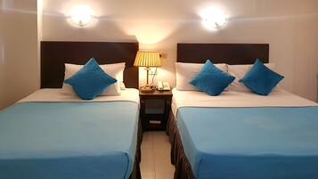 Standard Quadruple Room | Desk, blackout curtains, free WiFi, bed sheets