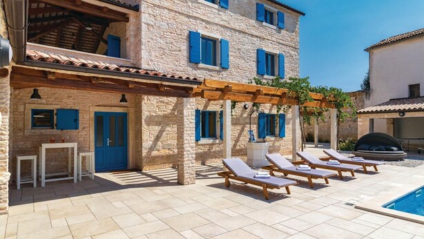A stone building with a pool, outdoor seating, and a pergola. - Beautiful home in Bokordici (Bokordici)