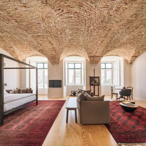 Suite, 1 King Bed, City View | In-room safe, individually decorated, individually furnished, desk