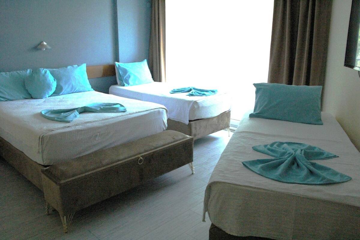 Double and 2 Single, Pool View | WiFi (free), bed sheets