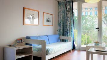 Apartment, 2 Bedrooms | Living area | Flat-screen TV