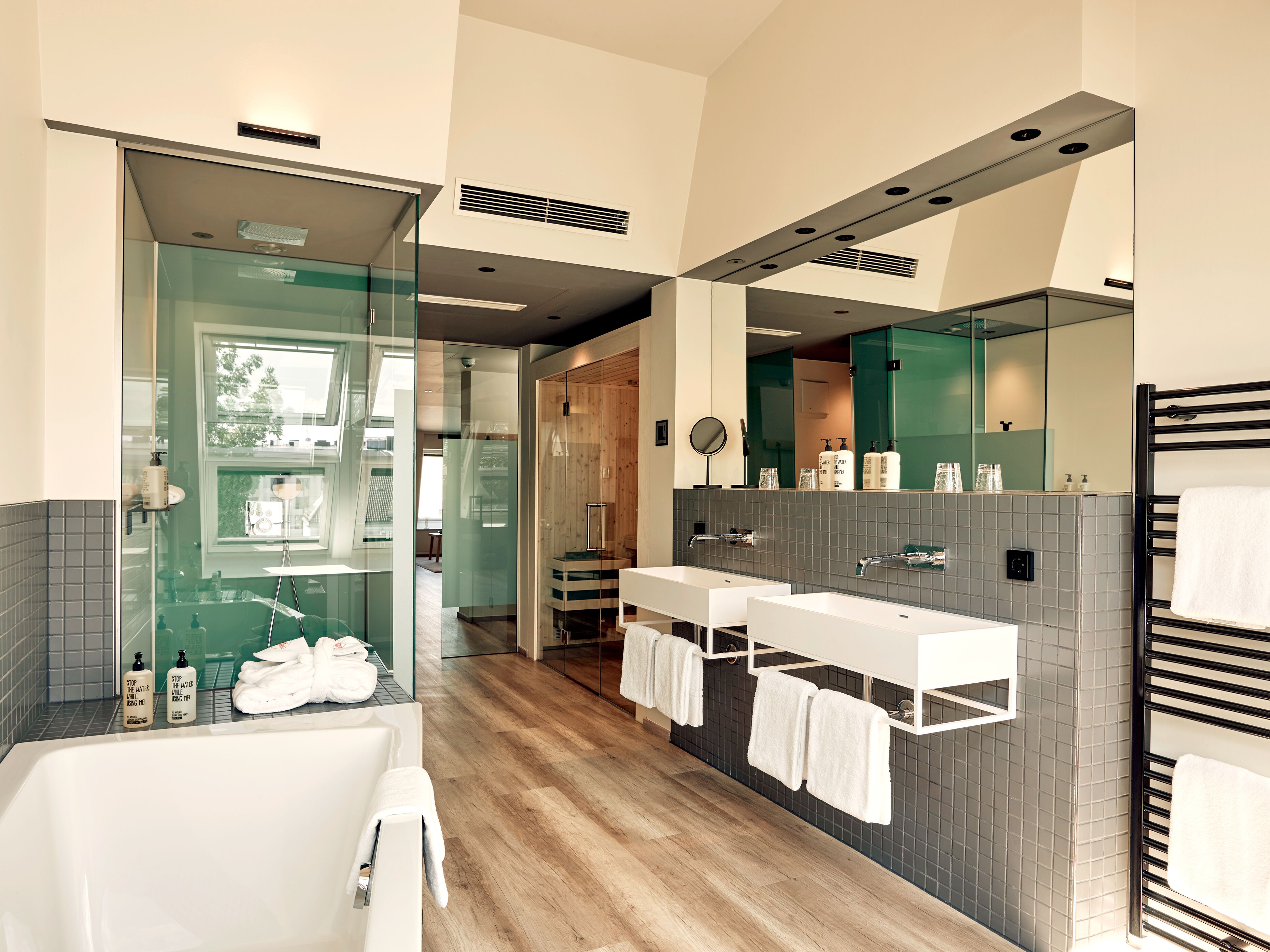 suite 63 | bathroom | free toiletries, hair dryer, bathrobes, slippers