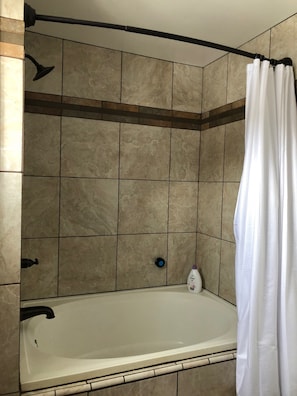 Combined shower/tub, hair dryer, towels, soap - Private Studio with A/C , Soaking Tub · Walk to UW & Downtown (Laramie)