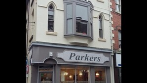 A storefront with a sign reading "Parkers."