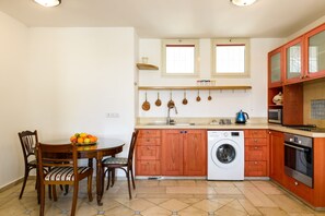 Apartment, City View | Private kitchen | Full-size fridge, microwave, oven, stovetop - Cozy & Oriental with Terrace (Tel Aviv)
