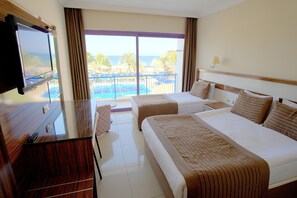 Literie hypoallergénique, minibar, coffres-forts dans les chambres