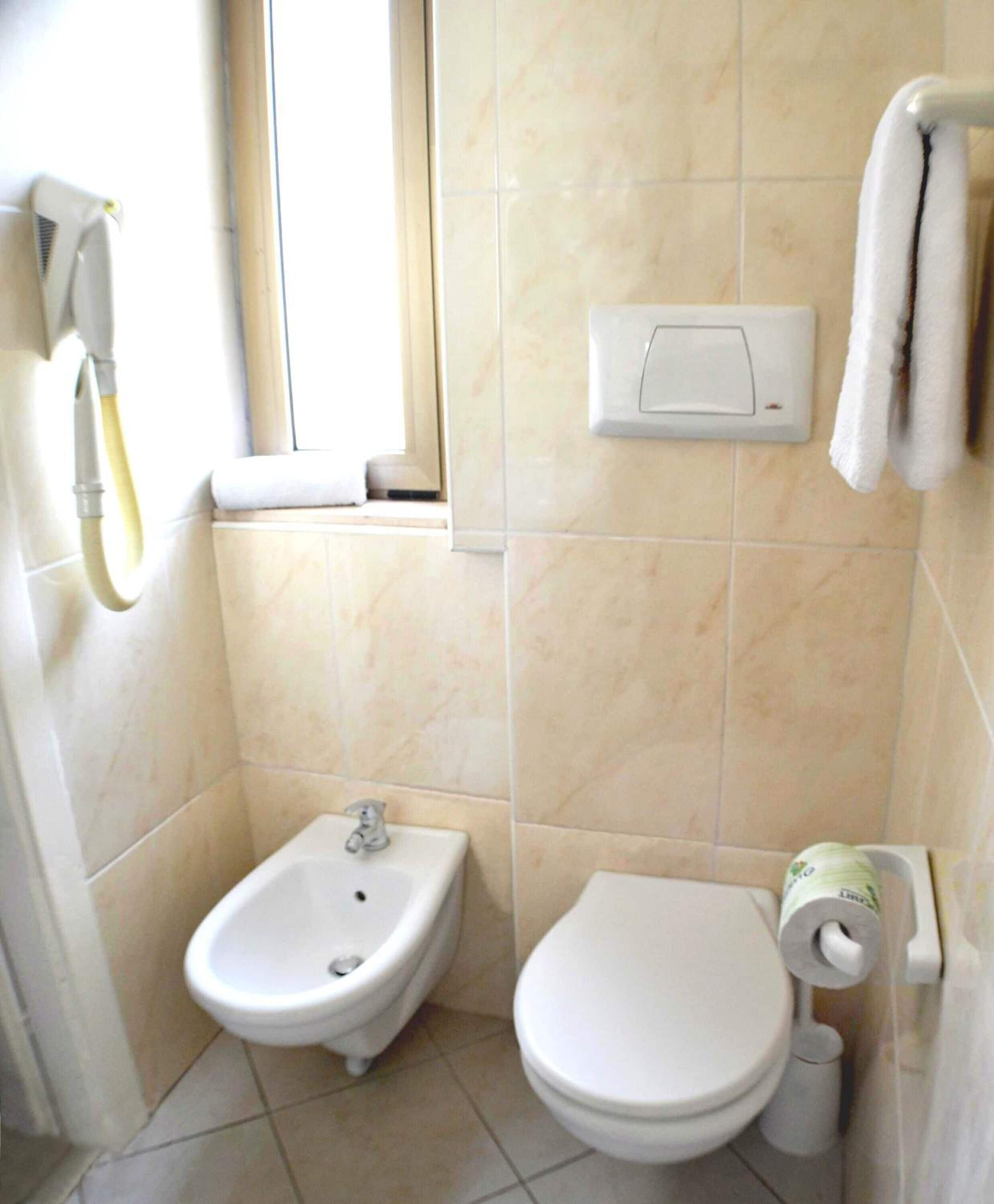 standard double or twin room, balcony, garden view | bathroom | shower, rainfall showerhead, free toiletries, hair dryer