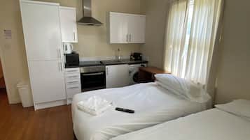 Laptop workspace, iron/ironing board, free WiFi, bed sheets