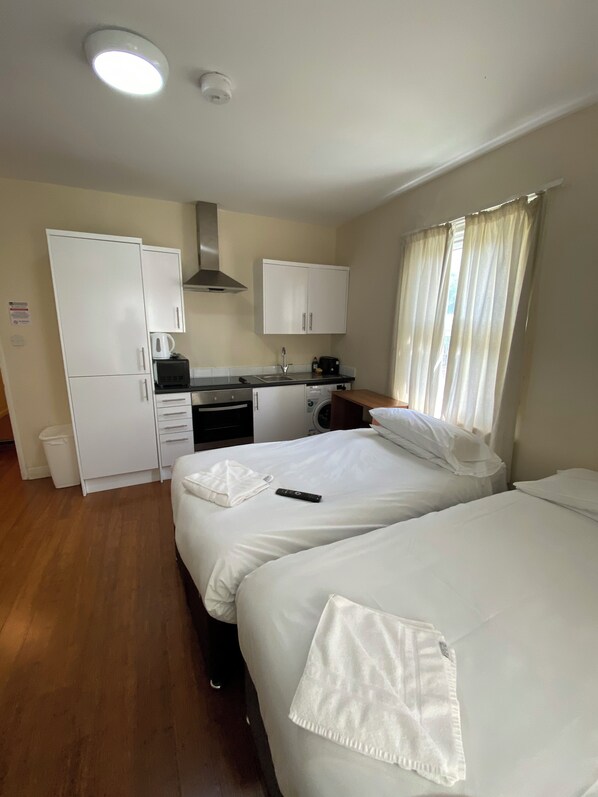 Laptop workspace, iron/ironing board, free WiFi, bed sheets