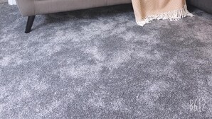 A grey sofa with three yellow pillows and a beige throw blanket. - Two bedrooms self-contained flat with Free Parking - Flat 2 (Nottingham)
