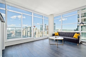 Premium Suite, 2 Queen Beds, City View, Tower | Living room | TV