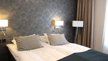 Premium bedding, minibar, desk, blackout curtains