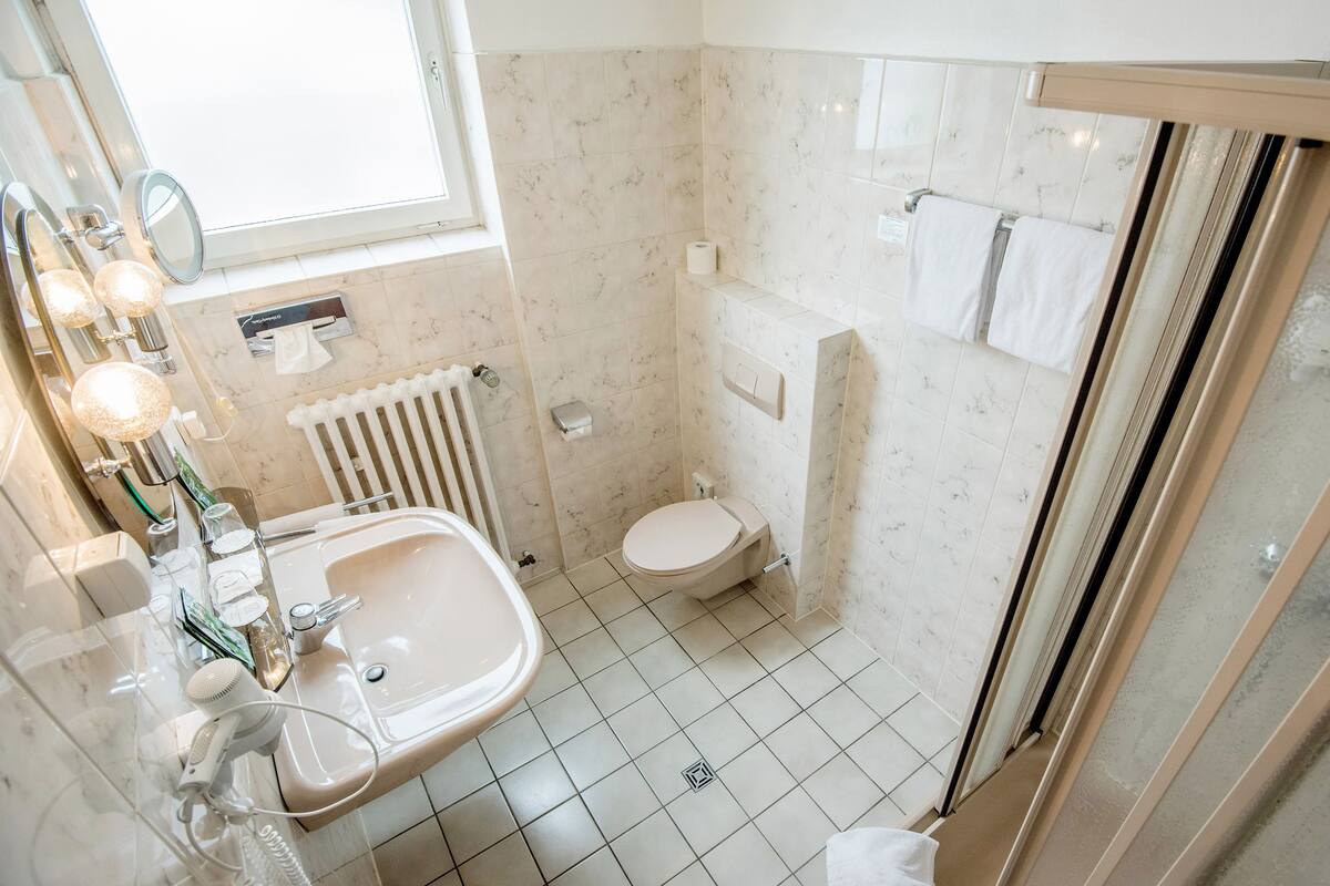 shower, free toiletries, hair dryer, bathrobes