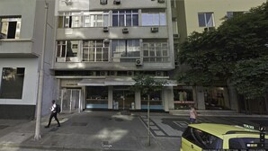 A multi-story building with a ground-level shop and a visible storefront. - LineRio Copacabana Luxury Residence 161 (Rio de Janeiro)