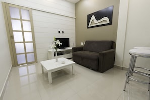 Apartment | Wohnbereich | Fernseher