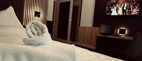 Eenpersoonskamer | Een kluis op de kamer, een bureau, geluiddichte muren, gratis wifi