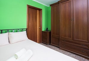 Premium bedding, blackout curtains, soundproofing, iron/ironing board